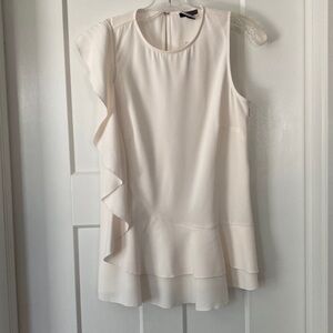 Beautiful sleeveless Top, size-XS, cream,ruffle on right side,zipper on side
